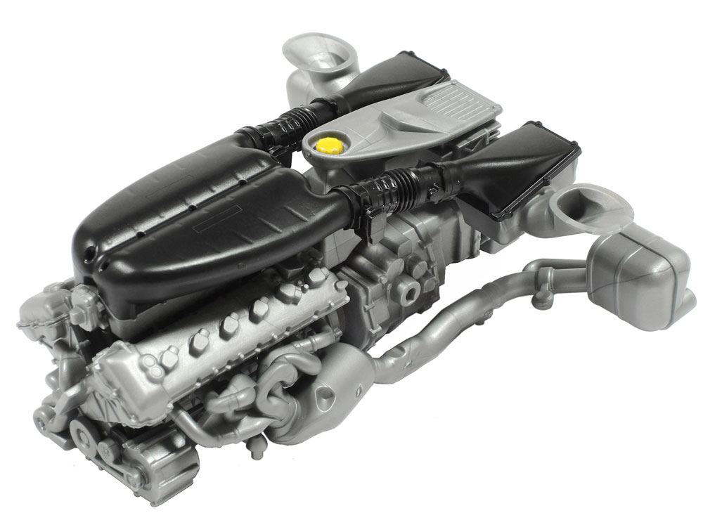 The V12 linked to hybrid system and transmission. (Image shows unpainted prototype)