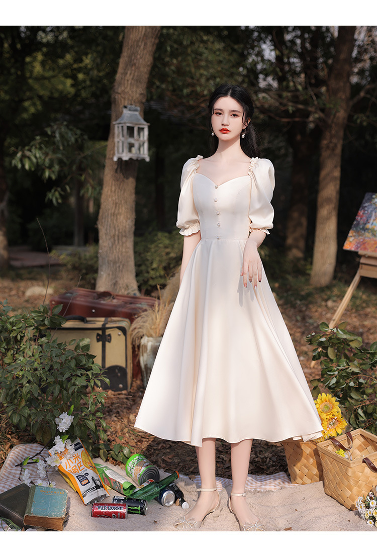 ชุดราตรี ชุดไปงานแต่งงาน ชุดออกงานสีครีมเบจ เดรสสั้นแขนตุ๊กตาแต่งกระดุมมุกกระโปรงทรงบาน สวยหวานเรียบหรูดูดี ใส่ได้ทั้งงานกลางวัน กลางคืน