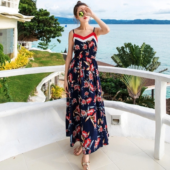 ชุดไปเที่ยวทะเล แม็กซี่เดรสยาวสีกรมท่าพิมพ์ลายนก