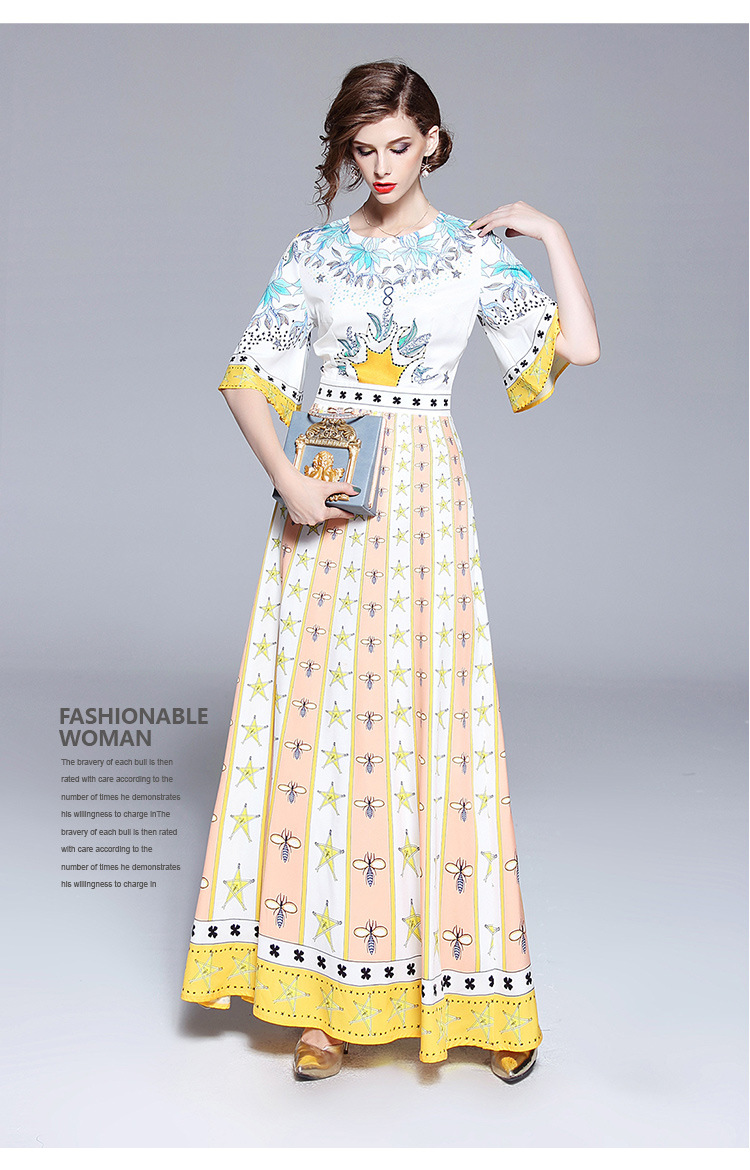 ชุดเดรสยาวสีเหลืองพิมพ์ลายดอกไม้ ลายดาว แขนสามส่วนทรงกว้าง กระโปรงยาวทรงบาน