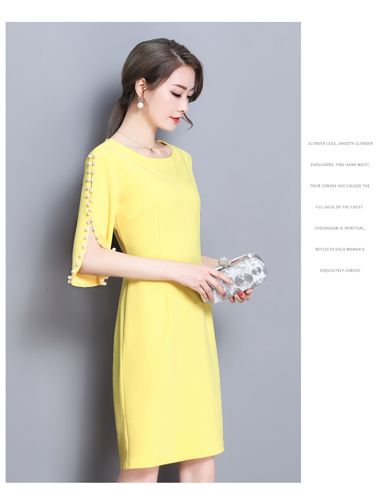 ชุดเดรสสั้นสีเหลือง แขนแต่งมุก ทรงตรง แถมฟรีเข็มกลัดดอกไม้