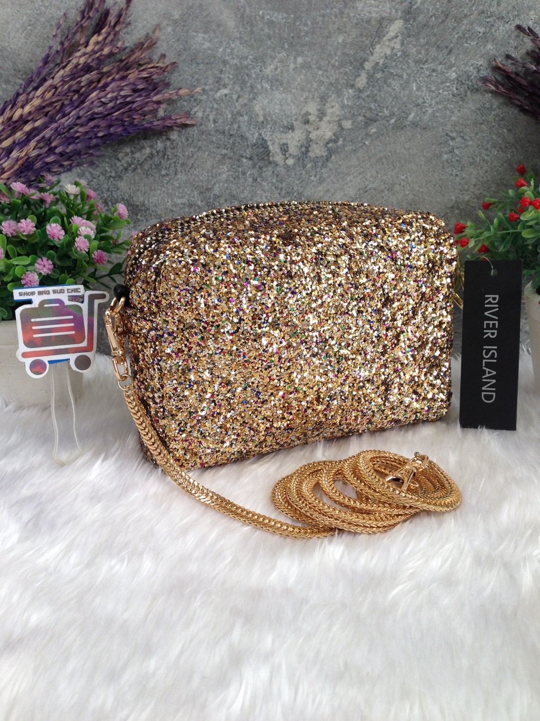 River Island กระเป๋าสะพายและครัช