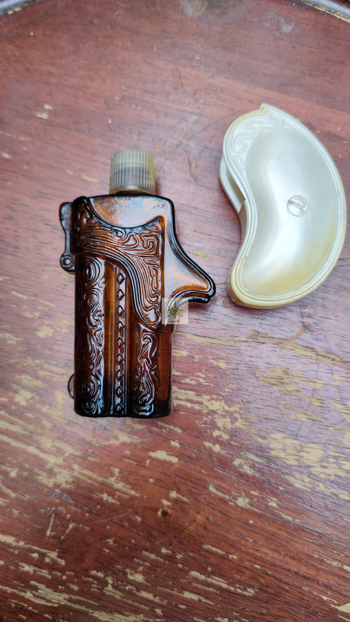 ขวดน้ำหอม AVON BLACK SUEDE รูปปืน