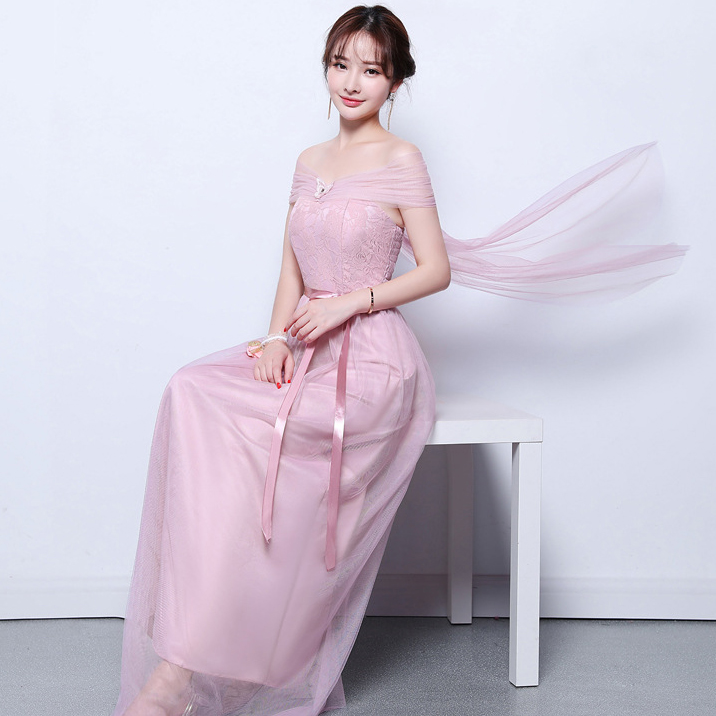 ชุดราตรียาวสีชมพู เปิดไหล่ผูกโบว์หลังน่ารักๆ กระโปรงยาวทรงบาน