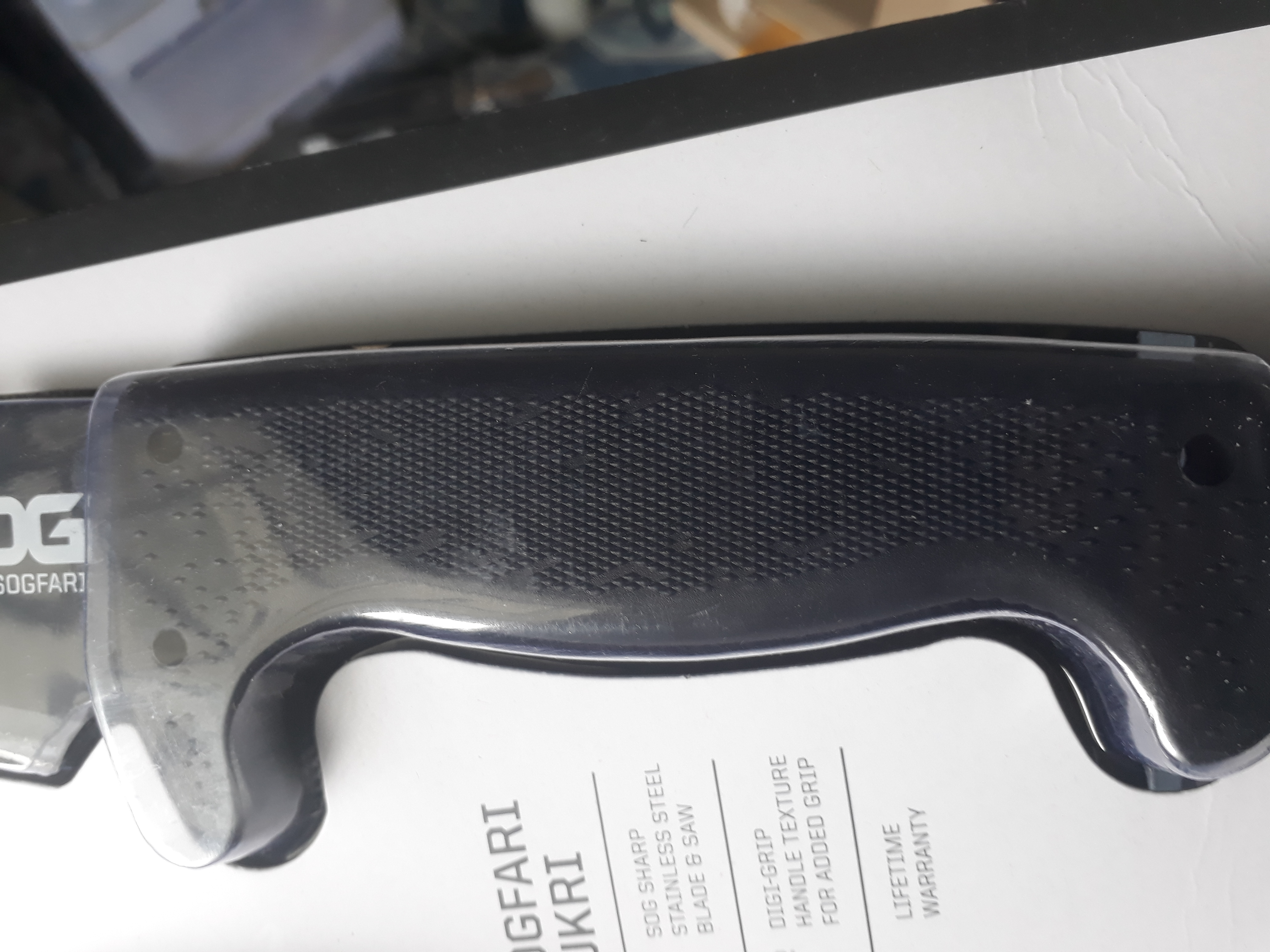 SOG SOGfari Kukri Machete MC11-N - Hardcased Black 12" Blade w/ Saw Back, Rubber Handle, Nylon Sheath