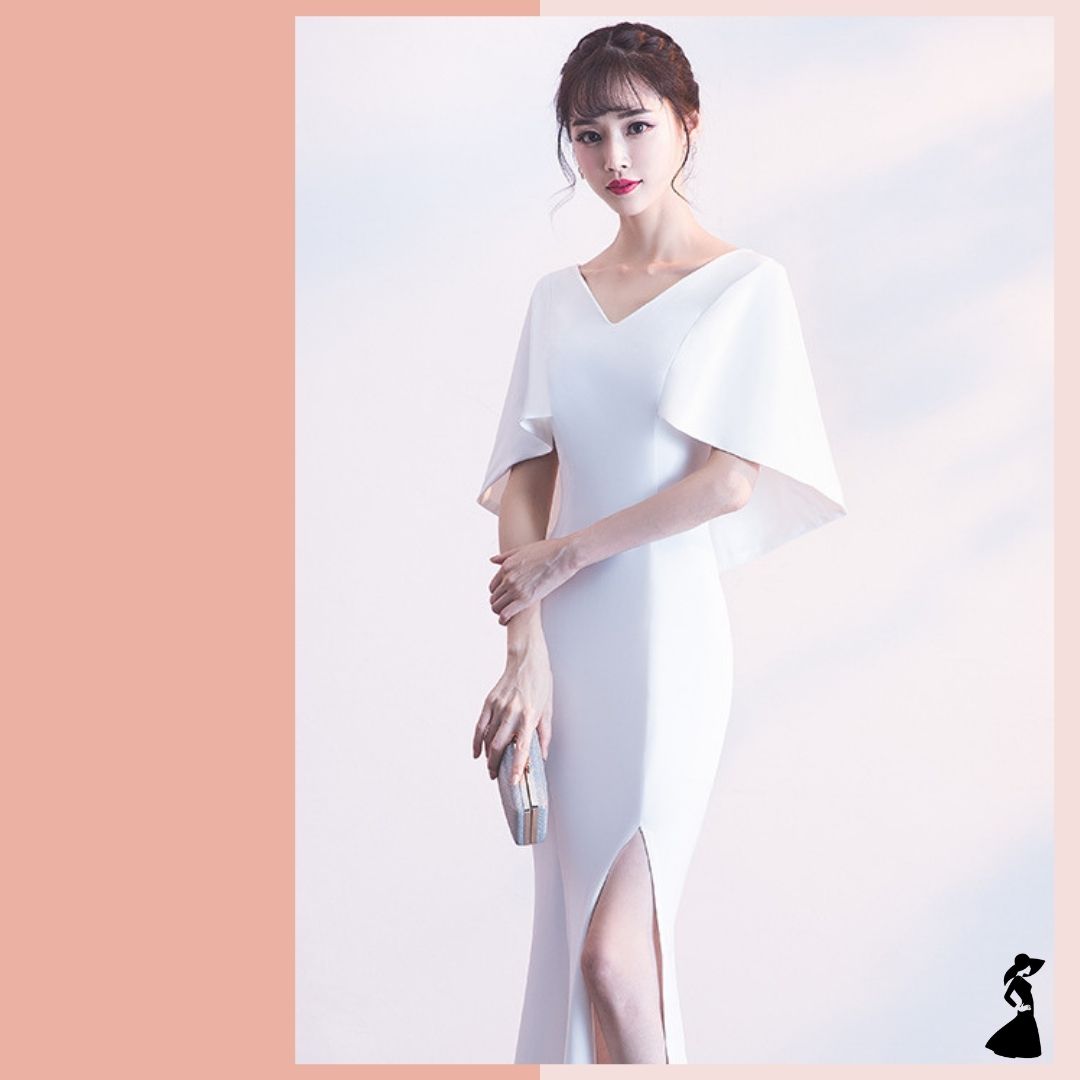 ชุดราตรี ชุดออกงาน ชุดไปงานแต่งงานสีขาว แขนทรงปีกค้างคาว กระโปรงยาวผ่าหน้า แนวเรียบหรู สวยหรูดูแพง