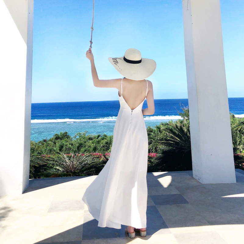 ชุดเที่ยวทะเล ชุดไปทะเลสีขาว แม็กซี่เดรสสายเดี่ยวโชว์หลัง ใส่เดินเล่นริมทะเล ถ่ายรูป