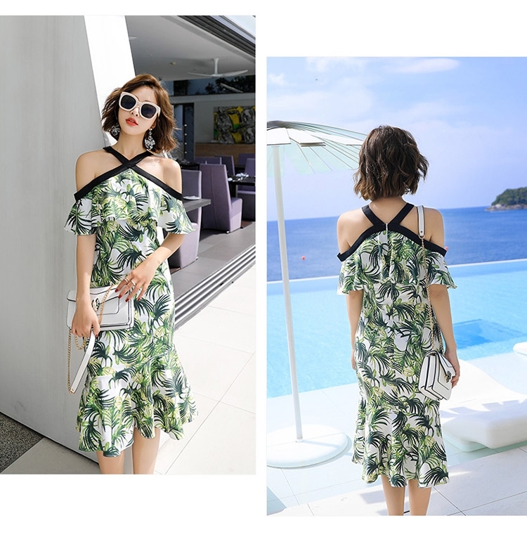 ชุดเดรสใส่ไปเที่ยวทะเลสั้นสีเขียว พิมพ์ลายสวยๆสไตล์ฮาวาย คอไขว้ เว้าไหล่ แขนระบาย