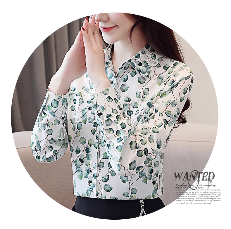 เสื้อเชิ้ตผู้หญิงสีขาว แขนยาว ผ้าชีฟอง ลายใบไม้สีเขียว คอปก กระดุมหน้า