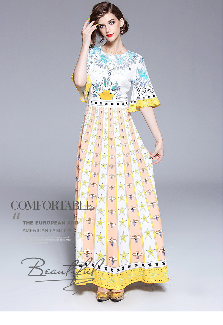 ชุดเดรสยาวสีเหลืองพิมพ์ลายดอกไม้ ลายดาว แขนสามส่วนทรงกว้าง กระโปรงยาวทรงบาน