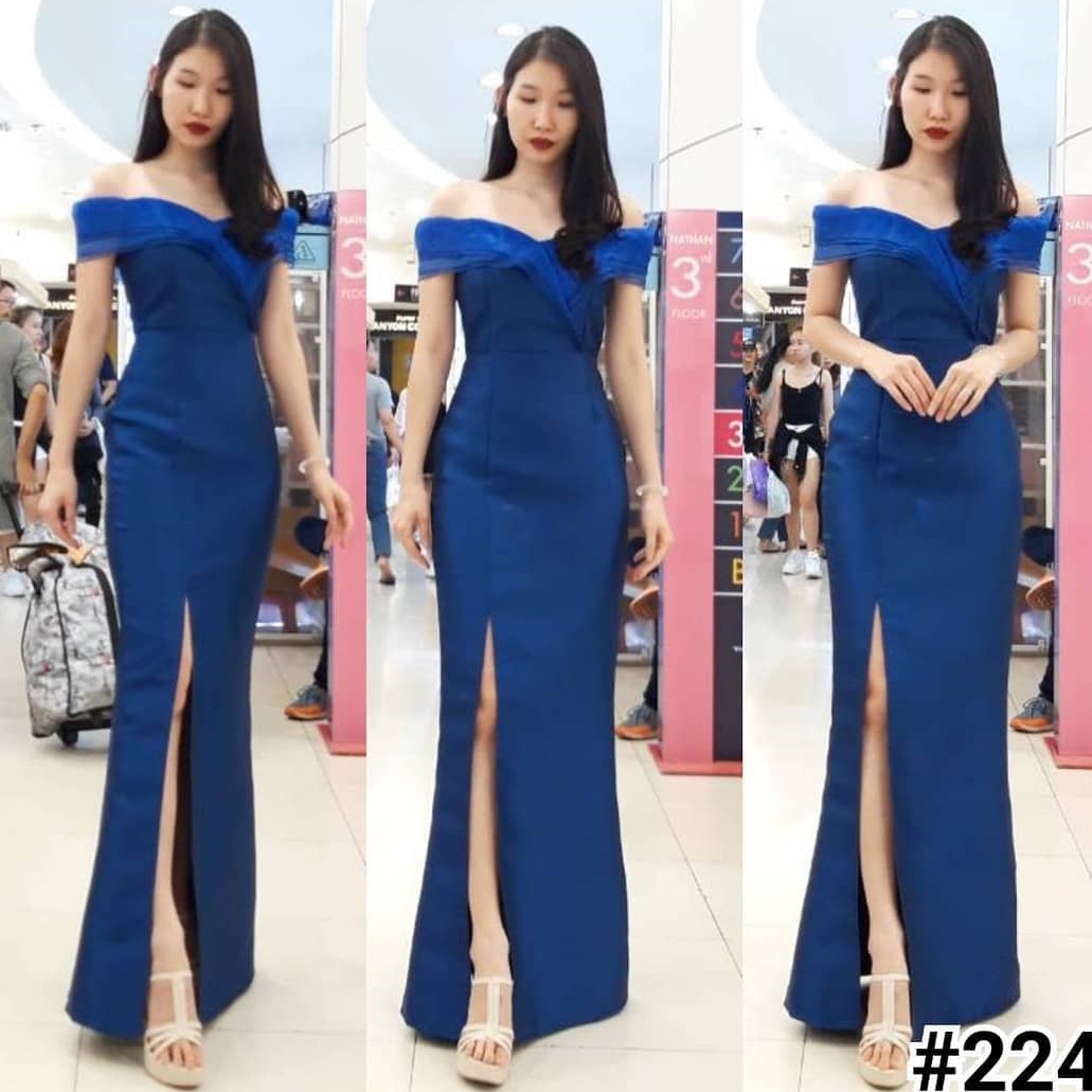 ชุดราตรียาวออกงานสีน้ำเงิน ทรงเปิดไหล่ระบายแต่งผ้าไหมแก้ว กระโปรงยาวผ่าหน้า