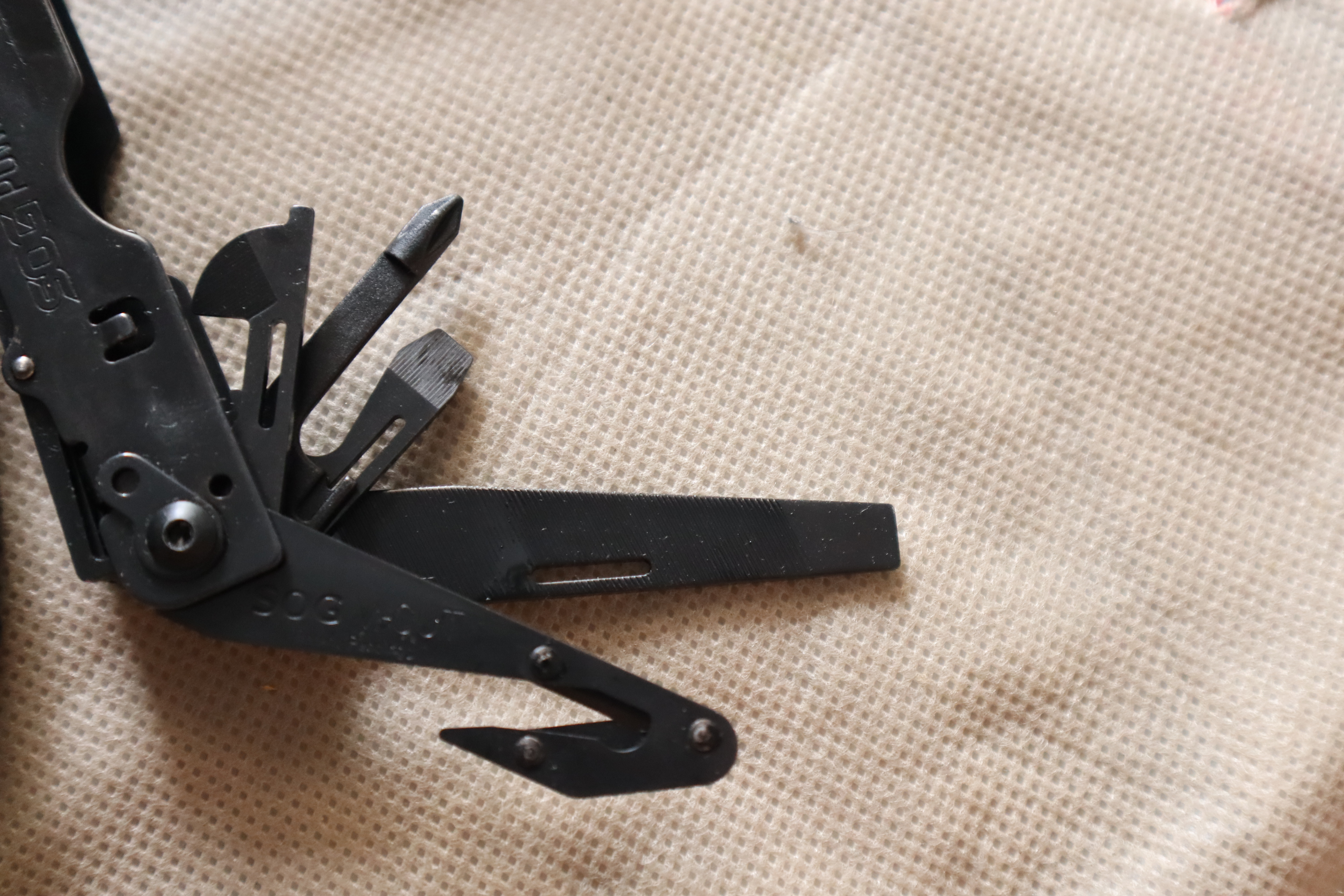 SOG PowerAssist Multi-Tool B66N-CP - 16 Tools, Black Oxide, Nylon Sheath,