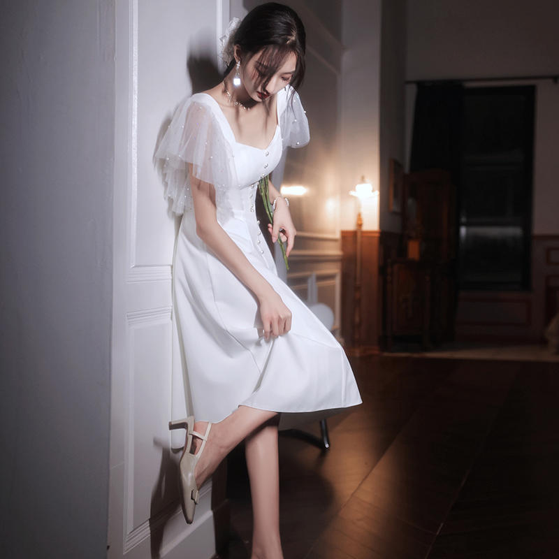 ชุดเดรสออกงานสีขาวสไตล์มินิมอล เรียบหรูสวยดูดี ใส่เป็น ชุดราตรี ชุดออกงาน ชุดไปงานแต่งงาน กลางวัน กลางคืน