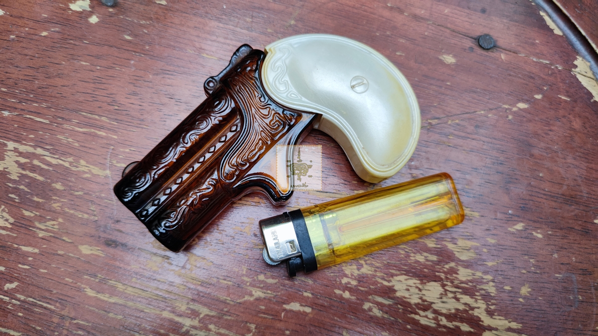 ขวดน้ำหอม AVON BLACK SUEDE รูปปืน