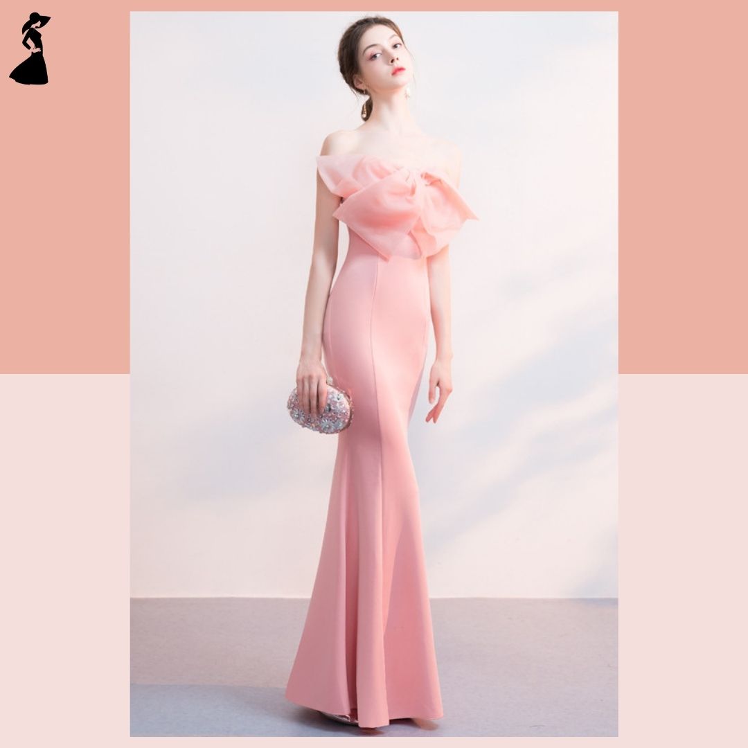 ชุดราตรี ชุดออกงาน ชุดไปงานแต่งงานสีโอโรส เดรสยาวเกาะอกแต่งโบว์ กระโปรงยาวทรงหางปลา แนวเรียบหรู สวยสง่า ดูแพง