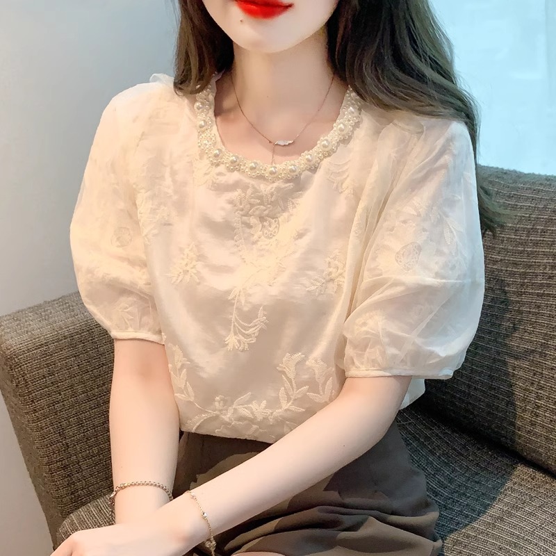 เสื้อเชิ้ตผู้หญิงลายจุด