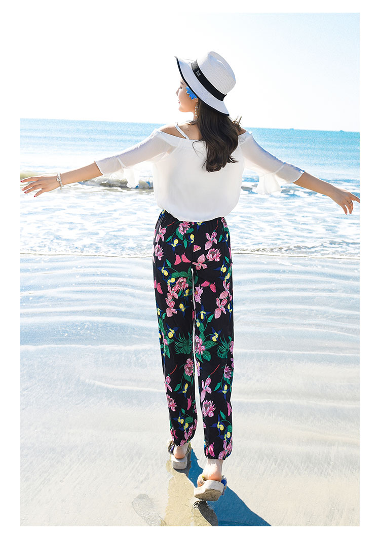 กางเกงขายาวใส่เที่ยวทะเลสีดำลายดอกไม้ เอวยืด แนวโบฮีเมียนสวยๆ