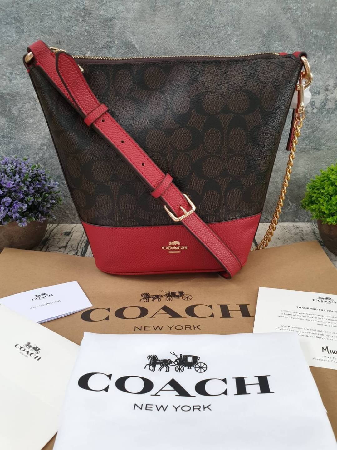 COACH SMALL PAXTON DUFFLE IN SIGNATURE CANVAS (COACH F76669