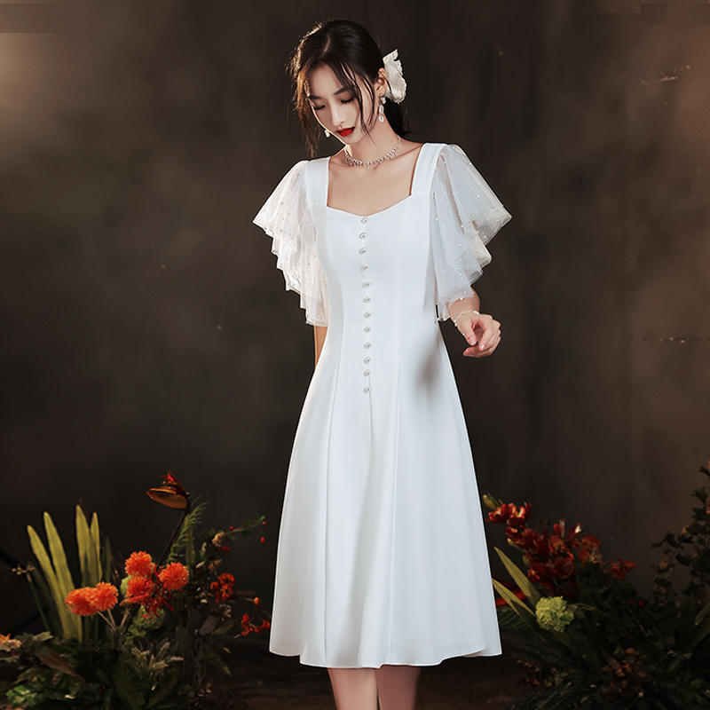 ชุดเดรสออกงานสีขาวสไตล์มินิมอล เรียบหรูสวยดูดี ใส่เป็น ชุดราตรี ชุดออกงาน ชุดไปงานแต่งงาน กลางวัน กลางคืน