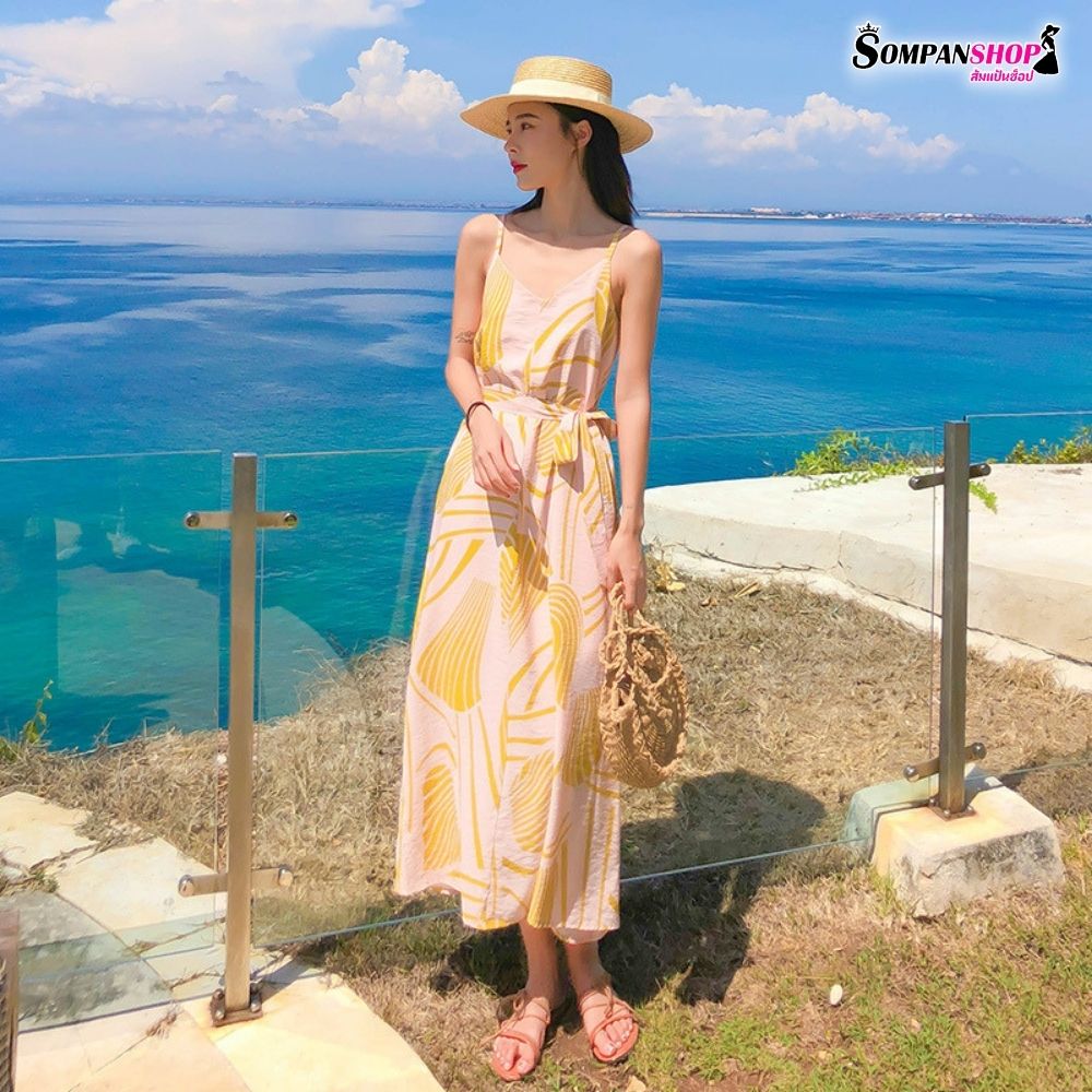 ชุดไปทะเล ชุดเที่ยวทะเล แม็กซี่เดรสยาวลายกราฟฟิกสีเหลือง สายเดี่ยว แฟชั่นชุดใส่เดินเล่นถ่ายรูปริมชายหาดสวยๆ