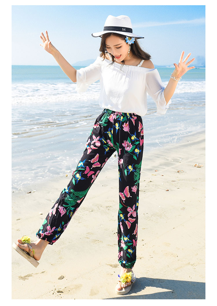 กางเกงขายาวใส่เที่ยวทะเลสีดำลายดอกไม้ เอวยืด แนวโบฮีเมียนสวยๆ