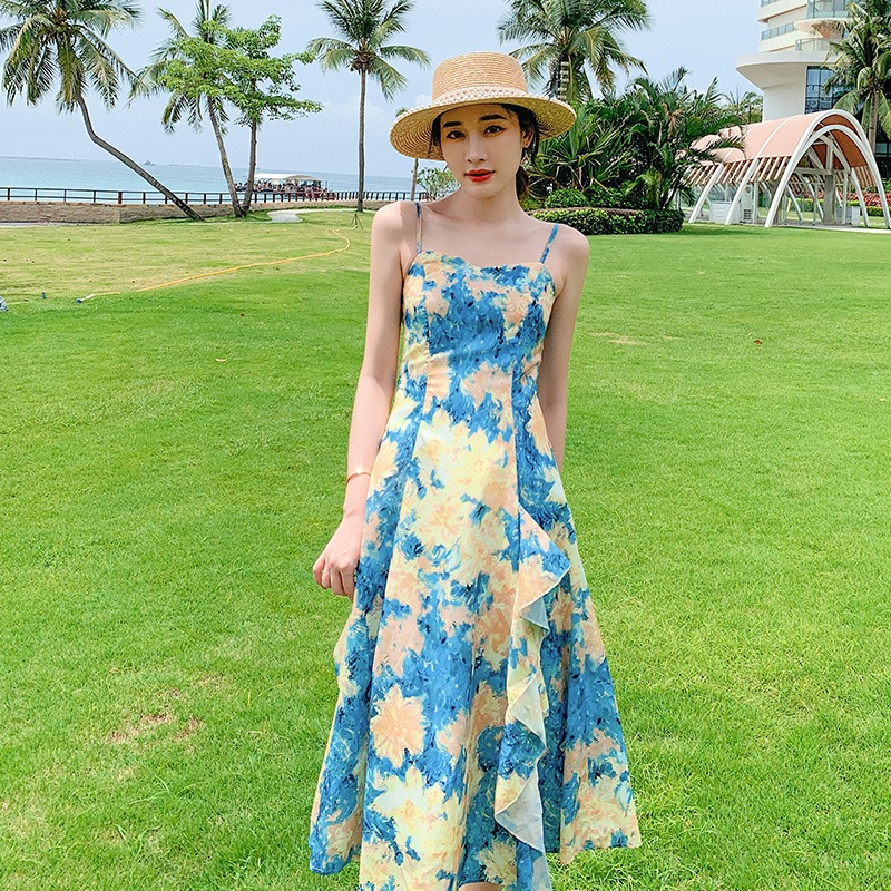ชุดเดรสยาวลายดอกไม้สีฟ้า สายเดี่ยว แฟชั่นชุดไปทะเล ชุดเที่ยวทะเล ชุดใส่เดินเล่นถ่ายรูปริมชายหาดสวยๆ