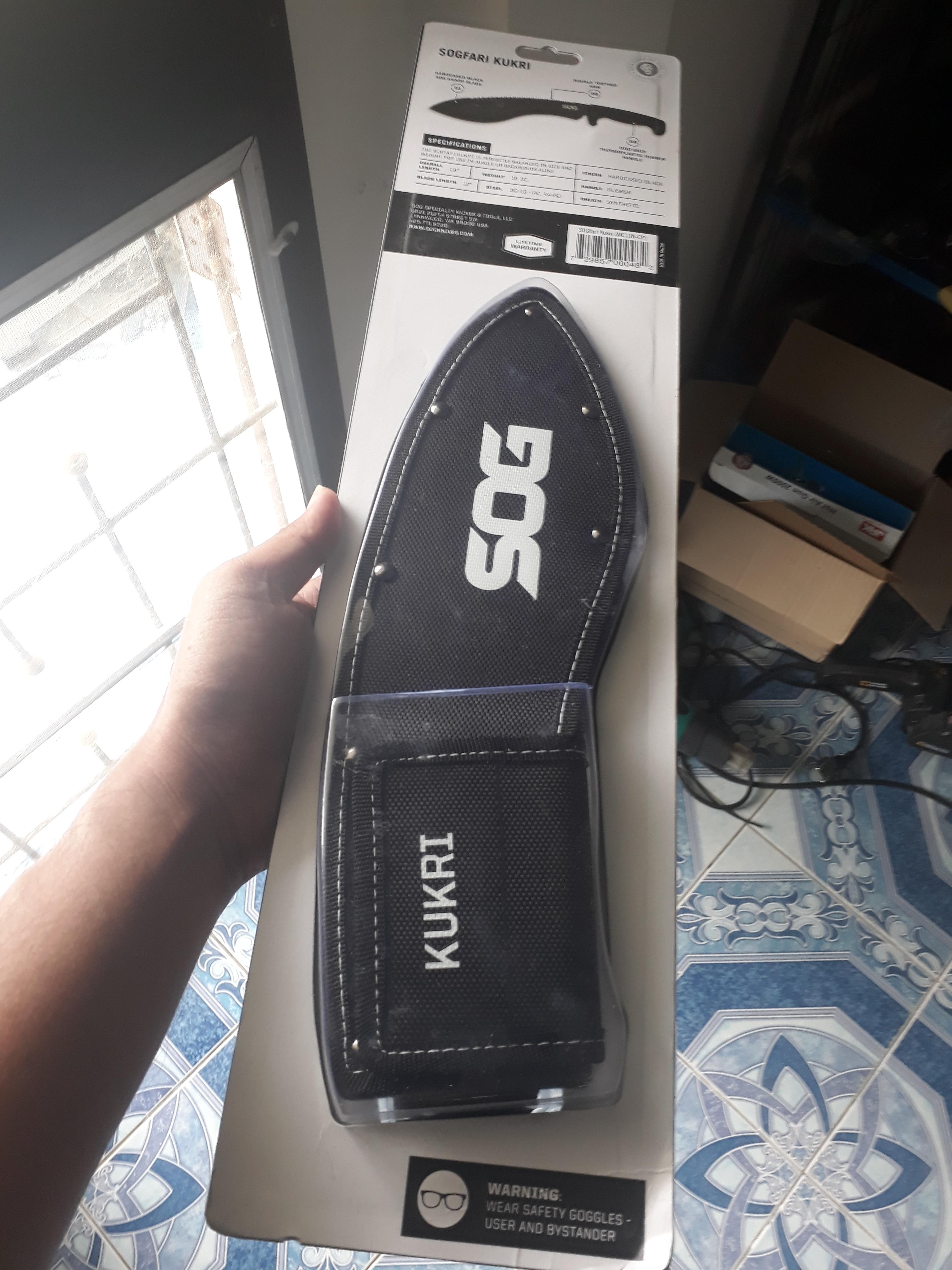 SOG SOGfari Kukri Machete MC11-N - Hardcased Black 12" Blade w/ Saw Back, Rubber Handle, Nylon Sheath