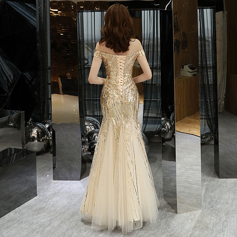 ชุดราตรี ชุดออกงาน ชุดไปงานแต่งงานสีทอง ผ้าปักเลื่อม เปิดไหล่ กระโปรงทรงหางปลา แนวเรียบหรู สวยสง่า ดูอลัง