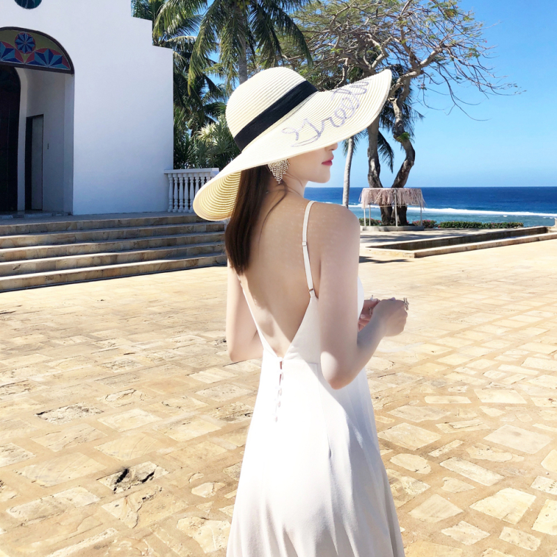 ชุดเที่ยวทะเล ชุดไปทะเลสีขาว แม็กซี่เดรสสายเดี่ยวโชว์หลัง ใส่เดินเล่นริมทะเล ถ่ายรูป