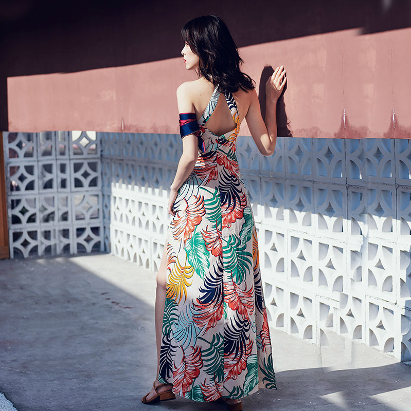 ชุดเที่ยวทะเล เดรสยาวสีครีมลายดอกไม้ ไขว้หลัง ลุคสวยๆ ชิคๆ