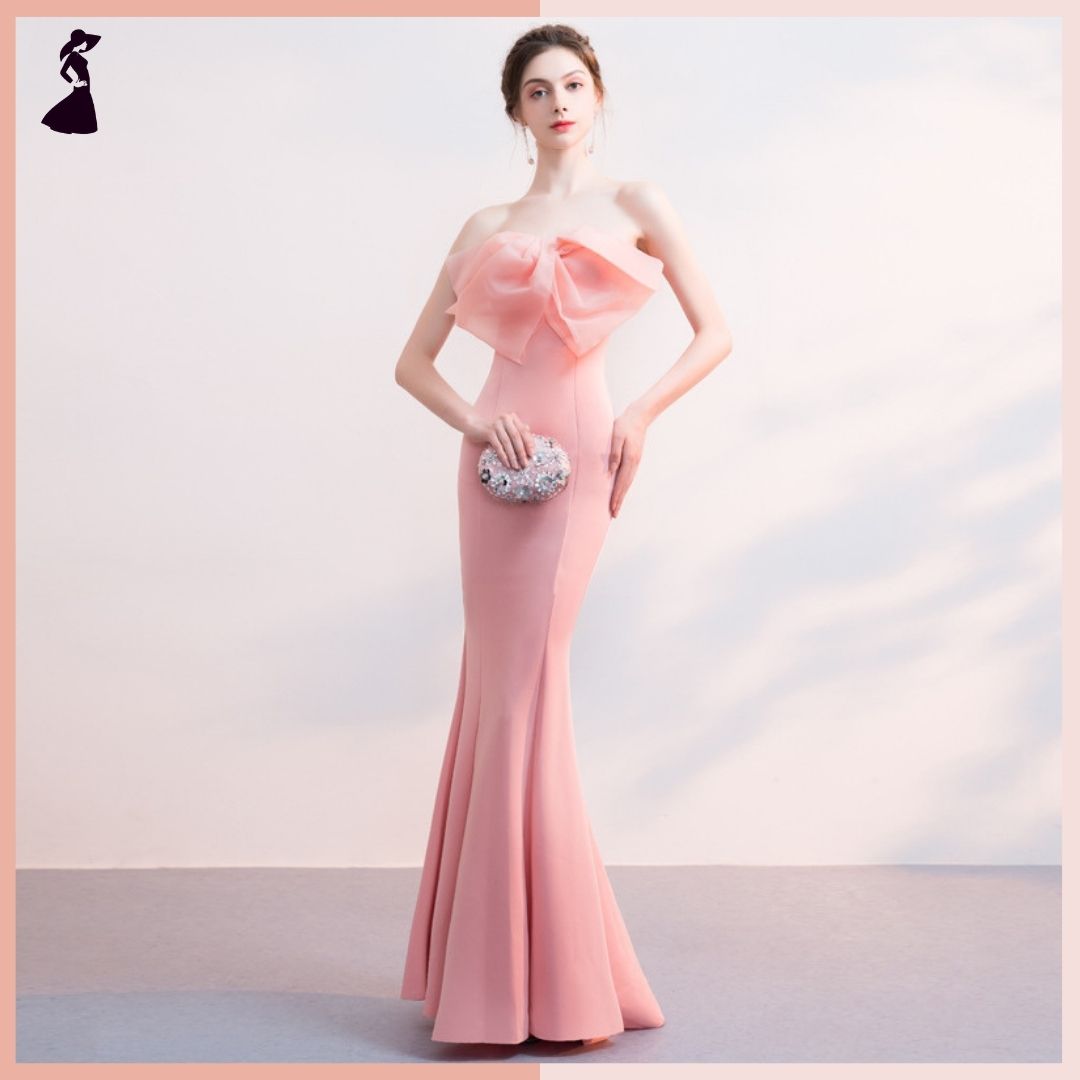 ชุดราตรี ชุดออกงาน ชุดไปงานแต่งงานสีโอโรส เดรสยาวเกาะอกแต่งโบว์ กระโปรงยาวทรงหางปลา แนวเรียบหรู สวยสง่า ดูแพง