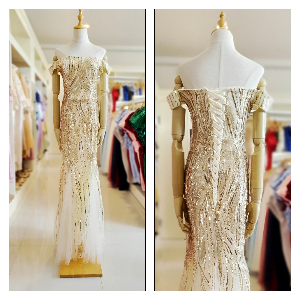 ชุดราตรี ชุดออกงาน ชุดไปงานแต่งงานสีทอง ผ้าปักเลื่อม เปิดไหล่ กระโปรงทรงหางปลา แนวเรียบหรู สวยสง่า ดูอลัง