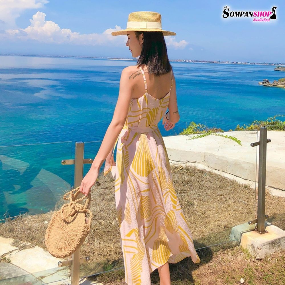 ชุดไปทะเล ชุดเที่ยวทะเล แม็กซี่เดรสยาวลายกราฟฟิกสีเหลือง สายเดี่ยว แฟชั่นชุดใส่เดินเล่นถ่ายรูปริมชายหาดสวยๆ