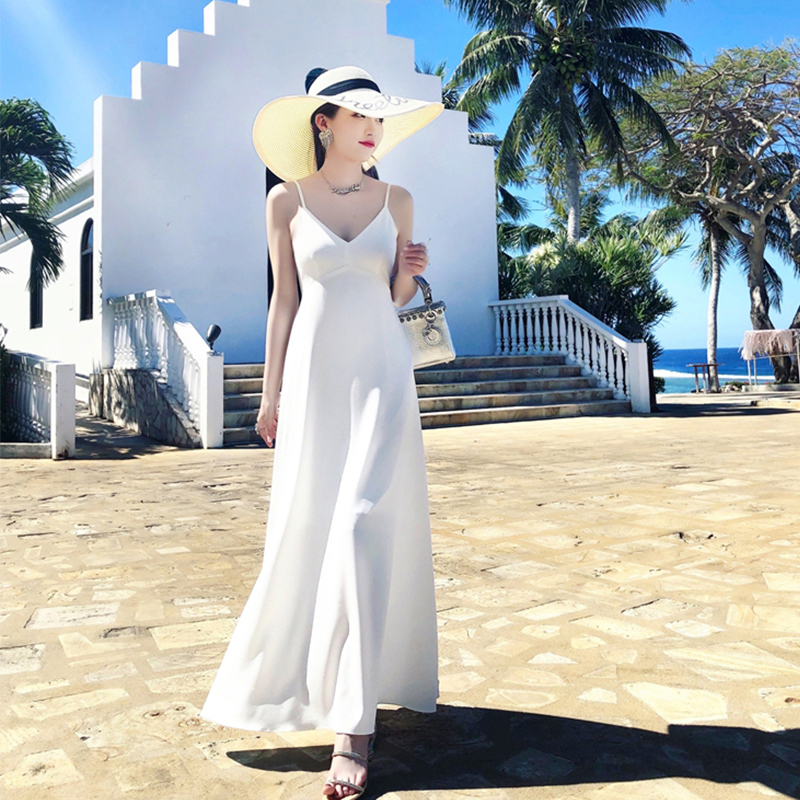 ชุดเที่ยวทะเล ชุดไปทะเลสีขาว แม็กซี่เดรสสายเดี่ยวโชว์หลัง ใส่เดินเล่นริมทะเล ถ่ายรูป