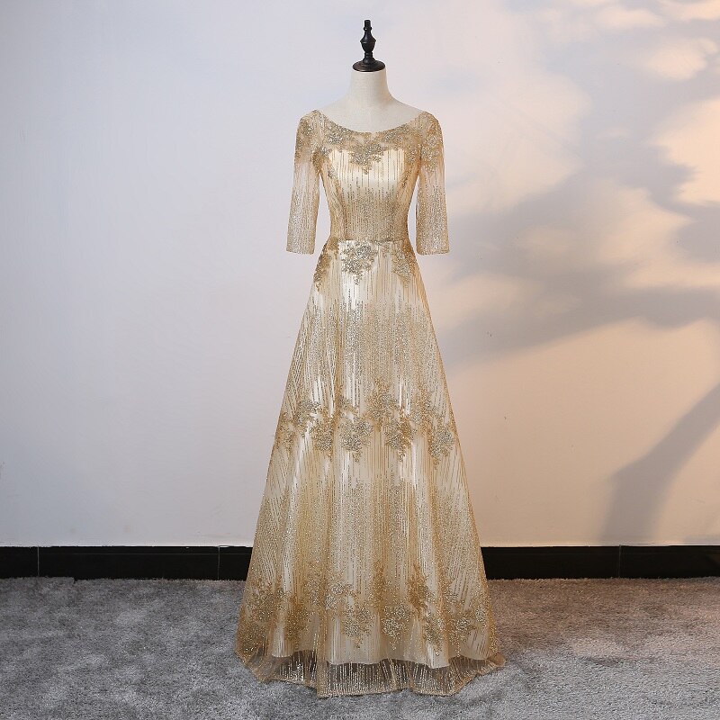 ชุดราตรียาวสีทอง ผ้ากากเพชร แขนสามส่วนกระโปรงยาว สวยหรูสง่ามากๆ ใส่เป็นชุดราตรี ชุดออกงาน ชุดไปงานแต่งงาน กลางวัน กลางคืน