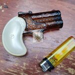 ขวดน้ำหอม AVON BLACK SUEDE รูปปืน