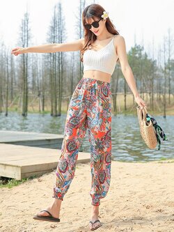 กางเกงขายาวลายโบฮีเมียนโทนสีส้ม ชุดใส่เดินเล่นถ่ายรูปริมชายหาดสวยๆ แฟชั่นชุดไปทะเล ชุดเที่ยวทะเล