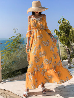 ชุดเที่ยวทะเล ชุดเดรสยาวสีเหลืองลายใบไม้ สายเดี่ยว เว้าไหล่